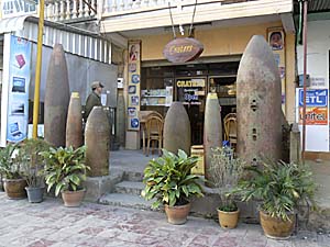 Bomb Shells at a Restaurant in Phonsavan by Asienreisender